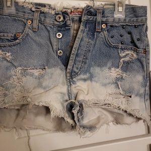 Distressed denim shorts